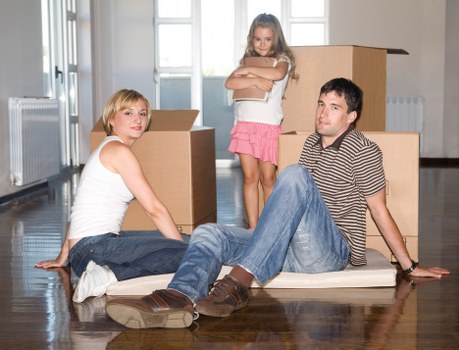 Expert packers handling boxes with care